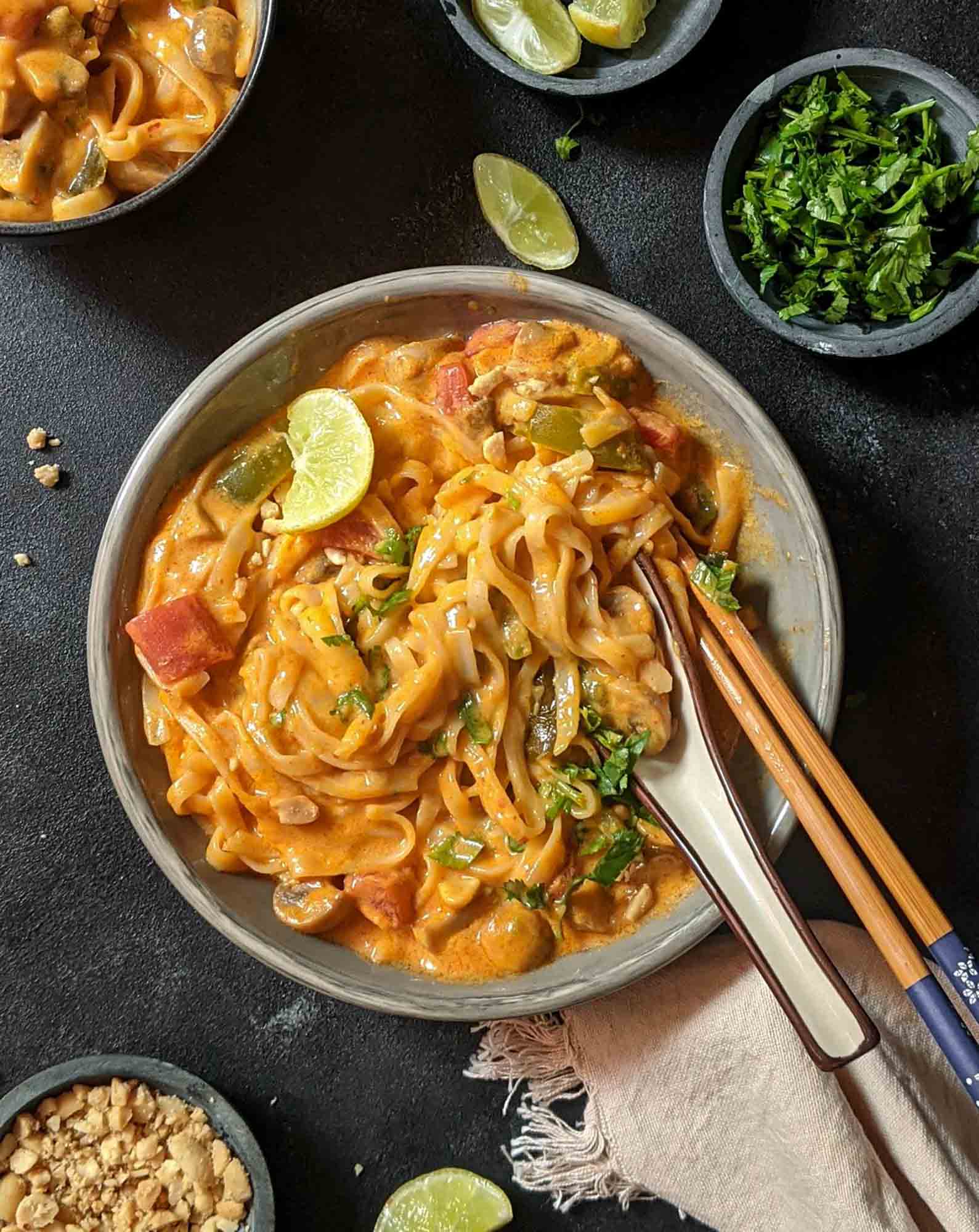 Creamy Thai Red Curry Udon Noodles - Serving Dumplings
